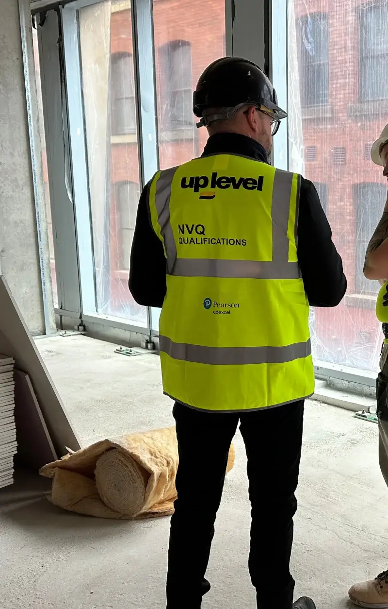 An Up Level assessor on a live construction site during an NVQ assessment