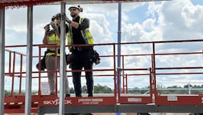 Two operatives installing SFS, metsec system in the workplace