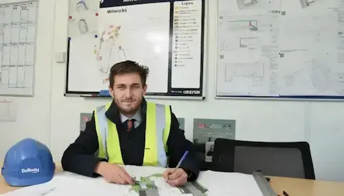Occupational Health and Safety NVQ Level 6 candidate at desk