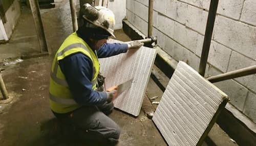 NVQ Level 2 fire stopper carrying out passive fire protection work